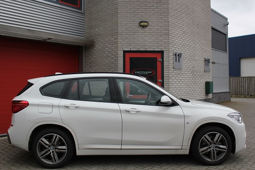 Rijervaring Chiptuning BMW X1 118d 150 PK 330 NM Zijkant