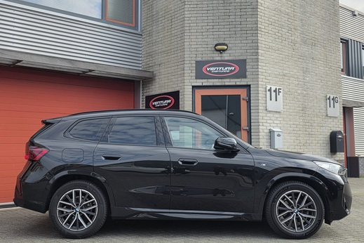 Rijervaring Chiptuning BMW X1 18i 136 PK U11 Zijkant
